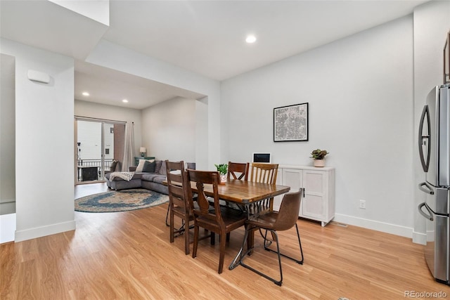 7808 W 43rd Pl, Wheat Ridge, CO 80033 - dining space featuring light wood finished floors, baseboards, and recessed lighting