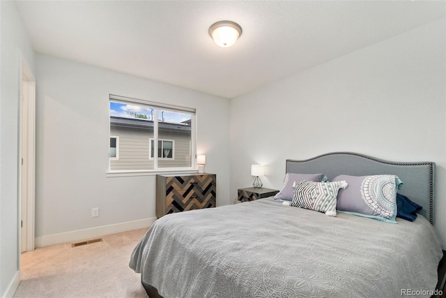 7808 W 43rd Pl, Wheat Ridge, CO 80033 - carpeted bedroom featuring baseboards