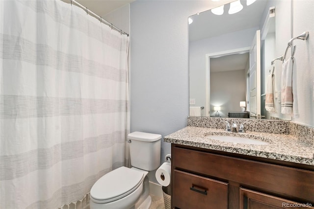 7808 W 43rd Pl, Wheat Ridge, CO 80033 - bathroom featuring vanity and toilet
