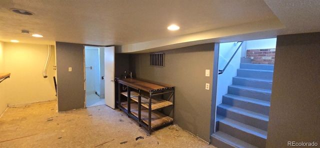 4635 Teller St, Wheat Ridge, CO 80033 - finished basement featuring recessed lighting and stairway