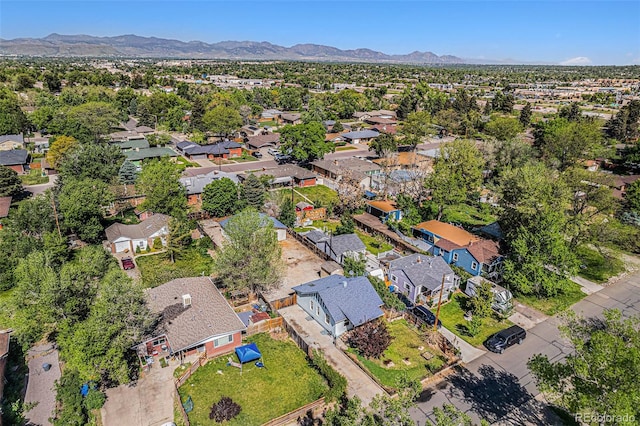 4635 Teller St, Wheat Ridge, CO 80033 - aerial view of property and surrounding area with a mountainous background and nearby suburban area