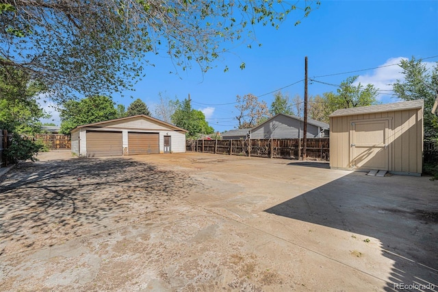 4635 Teller St, Wheat Ridge, CO 80033 - detached garage featuring a storage unit