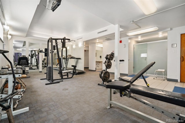 7040 E Girard Ave Unit 207, Denver, CO 80224 - gym with baseboards and carpet flooring