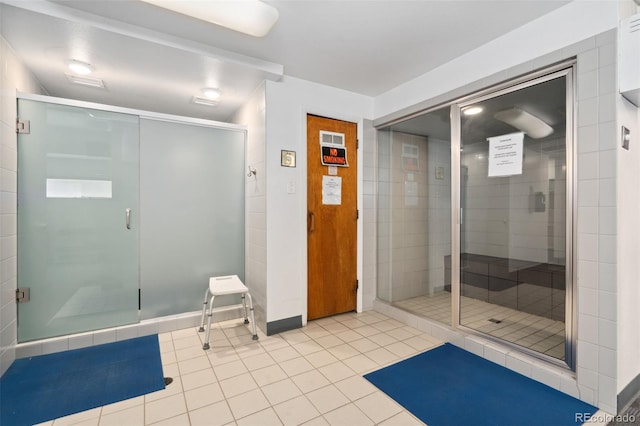 7040 E Girard Ave Unit 207, Denver, CO 80224 - full bathroom with tile patterned flooring and a shower stall