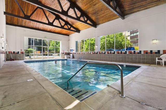 7040 E Girard Ave Unit 207, Denver, CO 80224 - indoor pool featuring a patio and a ceiling fan