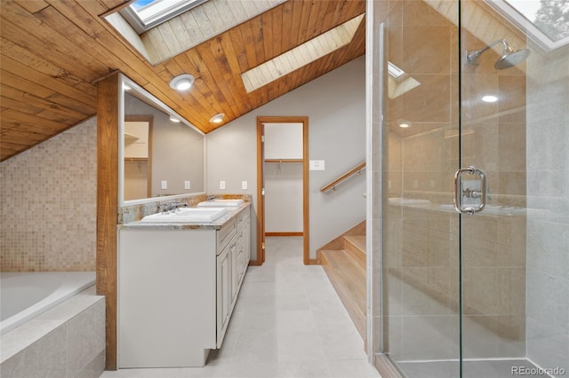 bathroom featuring plus walk in shower, vanity, lofted ceiling with skylight, and wood ceiling