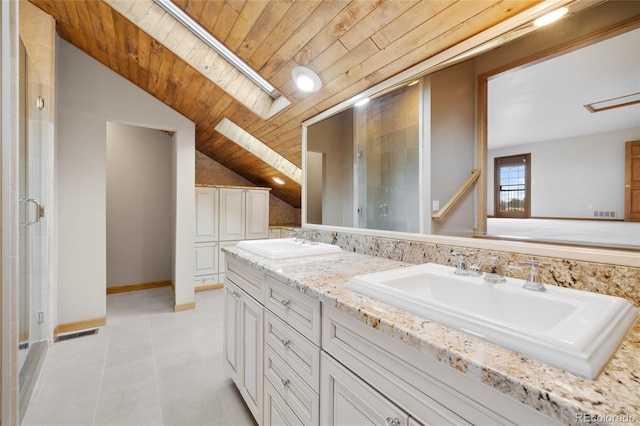 bathroom with vanity, vaulted ceiling with skylight, tile patterned flooring, a shower with shower door, and wood ceiling