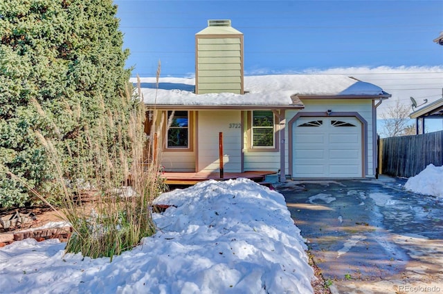 view of front of property featuring a garage