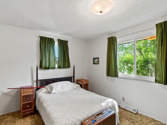 3018 S Depew St, Denver, CO 80227 - carpeted bedroom featuring a textured ceiling