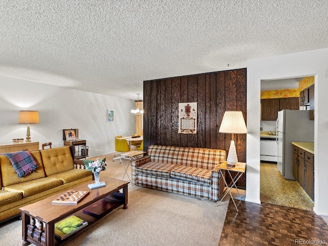 3018 S Depew St, Denver, CO 80227 - living room with a chandelier and a textured ceiling