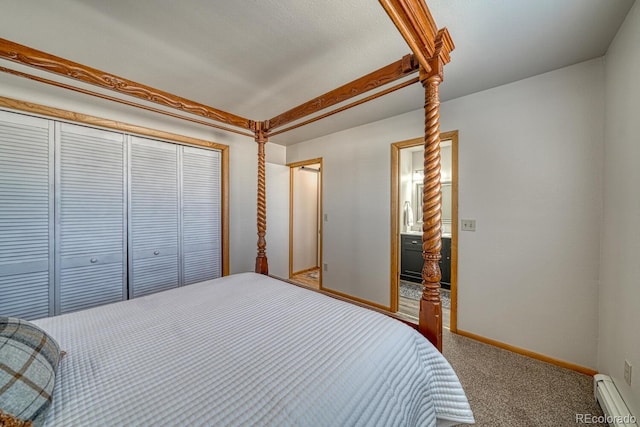 895 Acorn Rd, Cotopaxi, CO 81223 - bedroom featuring a baseboard heating unit, a closet, and carpet floors