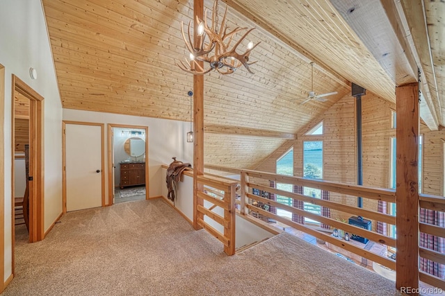 895 Acorn Rd, Cotopaxi, CO 81223 - hallway with a chandelier, wood ceiling, and carpet