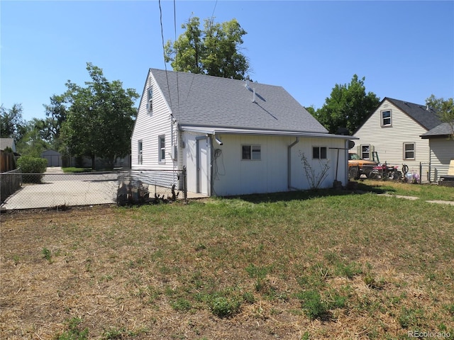 875 Kenton St, Aurora, CO 80010 - back of property with roof with shingles