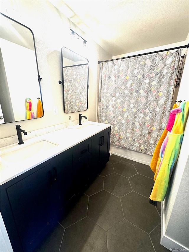 2831 Shadow Lake Rd, Lafayette, CO 80026 - full bathroom featuring double vanity, a shower with curtain, and tile patterned floors