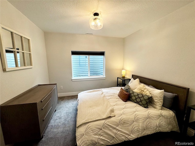 2831 Shadow Lake Rd, Lafayette, CO 80026 - bedroom featuring carpet floors, a textured ceiling, and baseboards