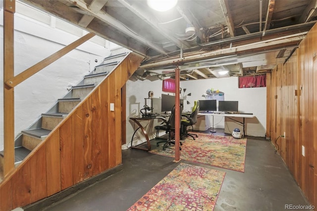 unfinished basement with stairway