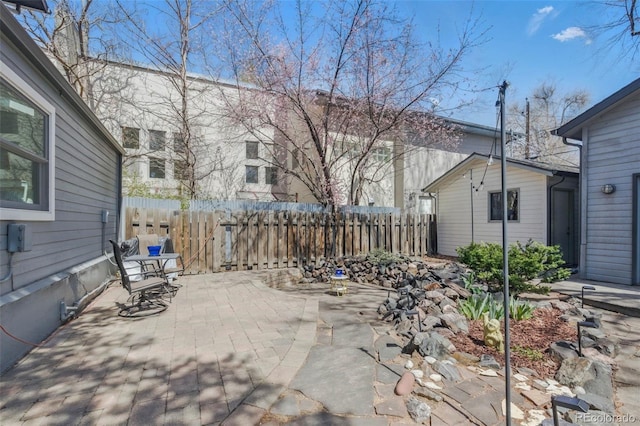 view of patio with fence