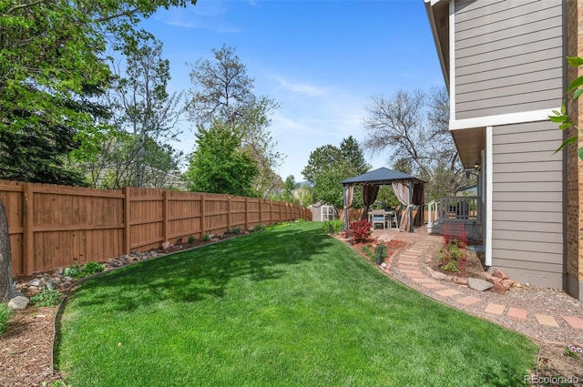 view of yard with a gazebo and a patio