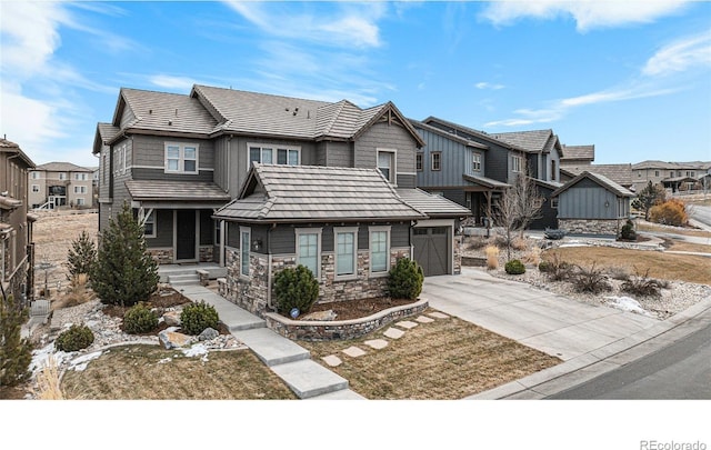 view of front of house with a garage and a front yard