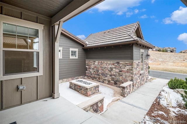 view of patio / terrace with a fire pit