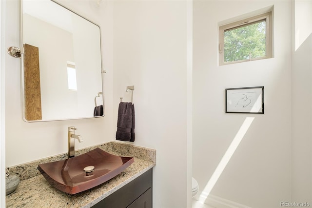 2990 Osceola St, Denver, CO 80212 - bathroom with vanity and toilet