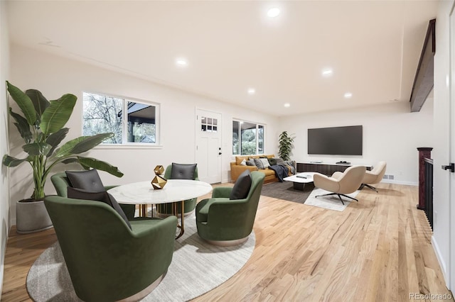 10751 W 66th Ave, Arvada, CO 80004 - living area featuring recessed lighting, baseboards, visible vents, and light wood-style flooring