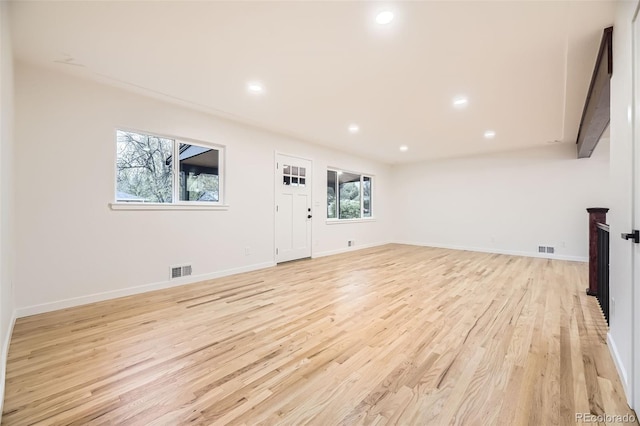 10751 W 66th Ave, Arvada, CO 80004 - interior space featuring recessed lighting, baseboards, light wood finished floors, and visible vents