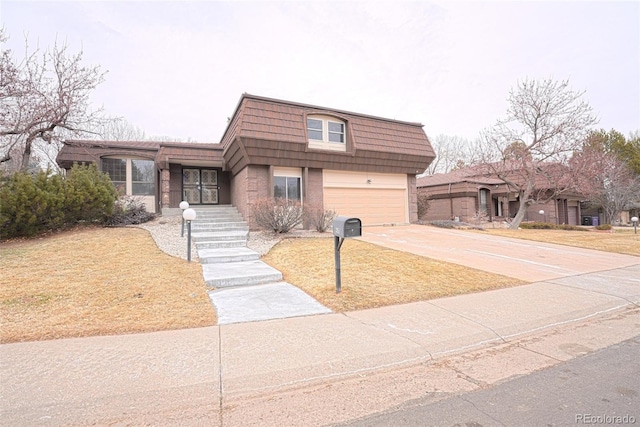 3957 S Peach Way, Denver, CO 80237 - view of front of property with a garage, concrete driveway, and mansard roof