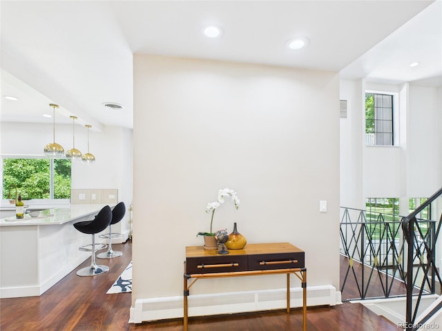 3957 S Peach Way, Denver, CO 80237 - hallway featuring wood finished floors and recessed lighting