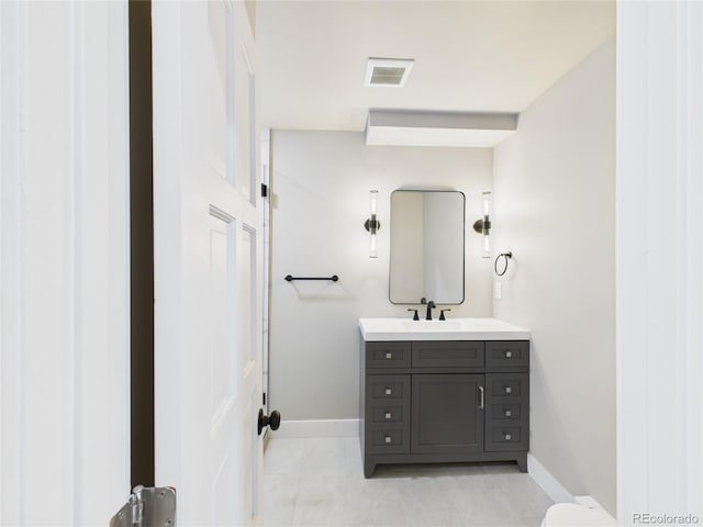 3957 S Peach Way, Denver, CO 80237 - bathroom with vanity and tile patterned flooring