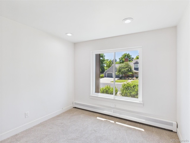 3957 S Peach Way, Denver, CO 80237 - empty room featuring baseboard heating, carpet, and recessed lighting