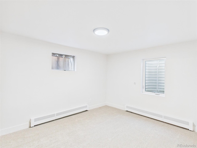 3957 S Peach Way, Denver, CO 80237 - unfurnished room featuring baseboard heating and light carpet