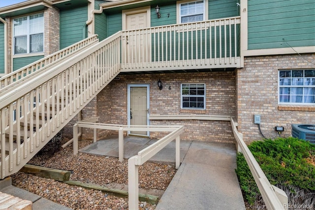 2710 E Otero Pl Unit 6, Centennial, CO 80122 - back of property with brick siding and stairway