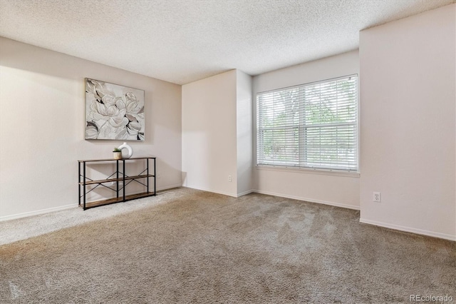 2710 E Otero Pl Unit 6, Centennial, CO 80122 - carpeted spare room with a textured ceiling