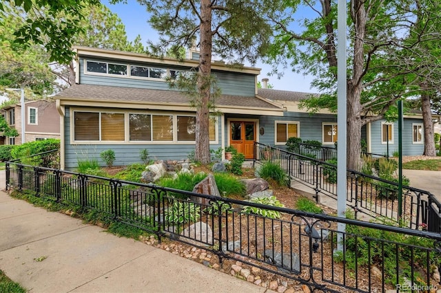 2710 E Otero Pl Unit 6, Centennial, CO 80122 - view of front of house with roof with shingles