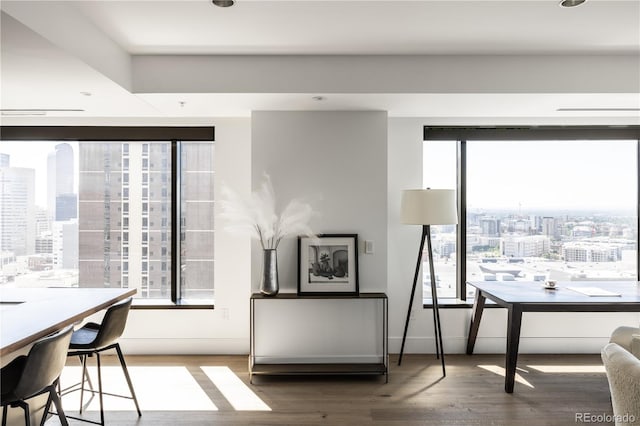 dining room with hardwood / wood-style floors