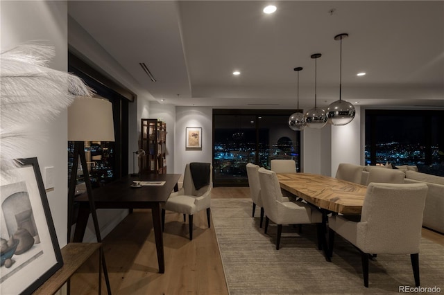 dining room featuring light hardwood / wood-style floors