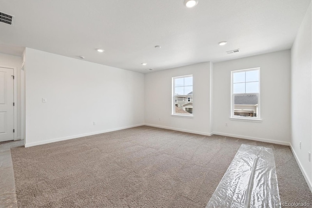 24748 E 40th Ave, Aurora, CO 80019 - carpeted empty room featuring recessed lighting and baseboards