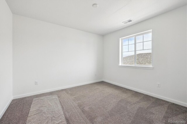 24748 E 40th Ave, Aurora, CO 80019 - carpeted spare room with baseboards