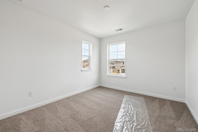 24748 E 40th Ave, Aurora, CO 80019 - carpeted spare room featuring baseboards