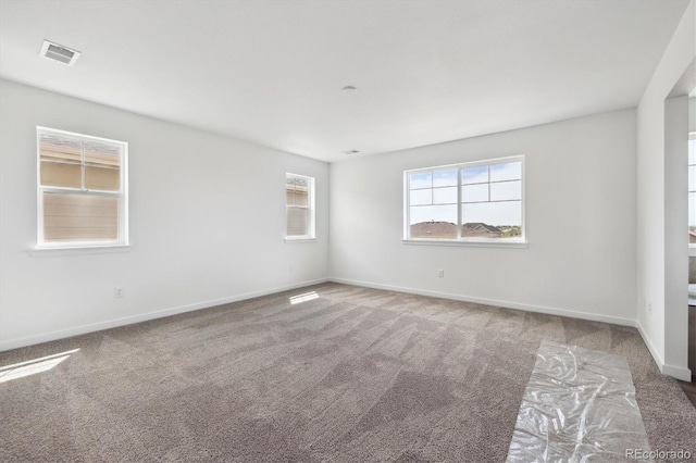 24748 E 40th Ave, Aurora, CO 80019 - empty room with carpet flooring and baseboards