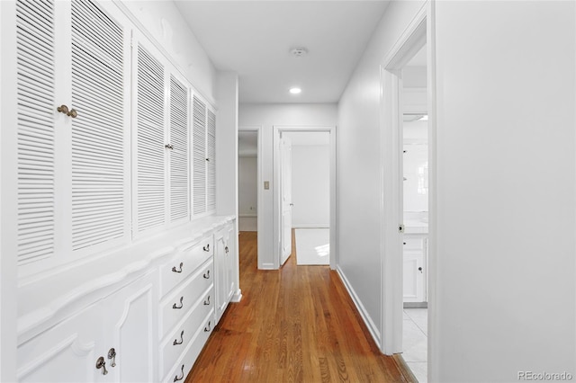 hallway featuring light hardwood / wood-style flooring