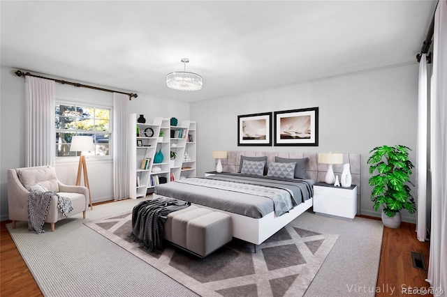 bedroom featuring wood-type flooring