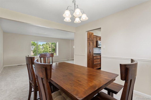 874 Mercury Cir, Lone Tree, CO 80124 - dining room with a chandelier and light colored carpet