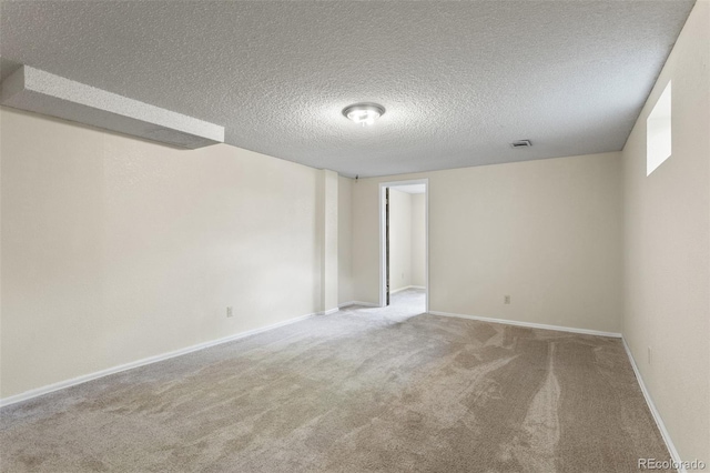 874 Mercury Cir, Lone Tree, CO 80124 - carpeted empty room with a textured ceiling and baseboards