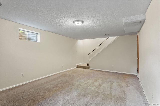 874 Mercury Cir, Lone Tree, CO 80124 - basement with carpet flooring, a textured ceiling, and stairs