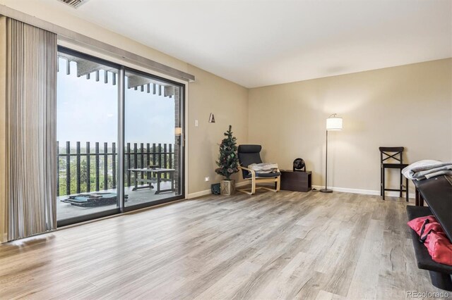 office with wood finished floors and baseboards