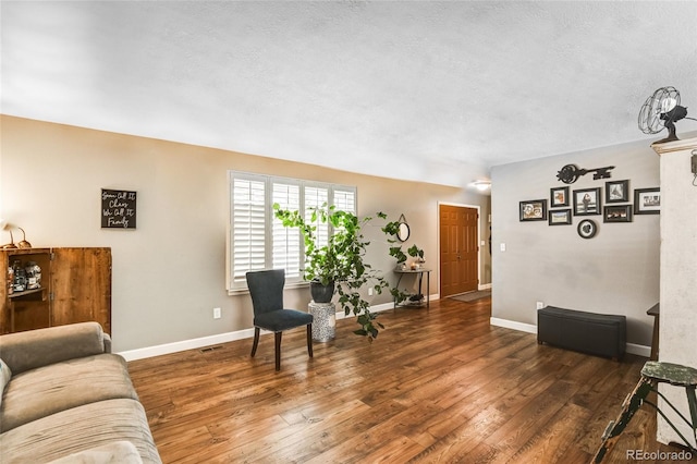 7394 S Field Ct, Littleton, CO 80128 - living room with hardwood / wood-style flooring and a textured ceiling