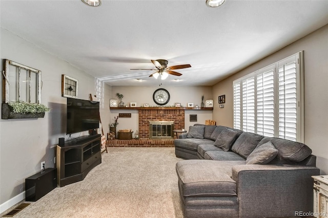 7394 S Field Ct, Littleton, CO 80128 - living area featuring a ceiling fan, a brick fireplace, and carpet