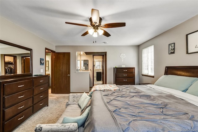 7394 S Field Ct, Littleton, CO 80128 - carpeted bedroom featuring connected bathroom and a ceiling fan